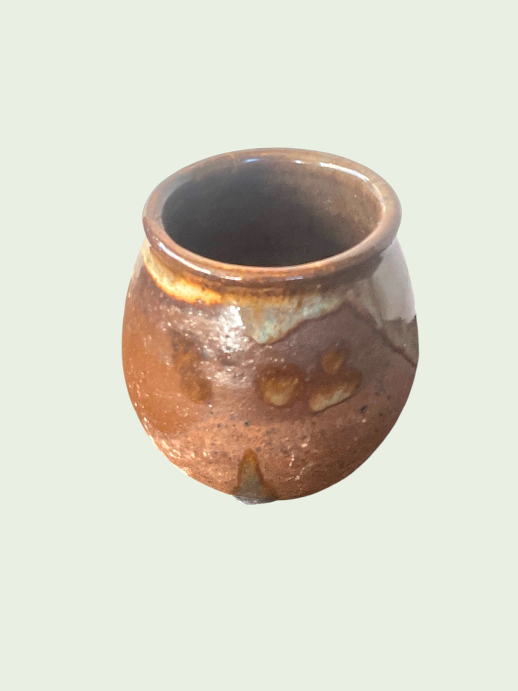 Mate Caldera Matera Rob® #3 — detalle de textura, gres bronce con manchas terracota y marcas del fuego, superficie artesanal única, Matera Rob®
